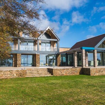 SlimLine 68 Aluminium Windows, ConceptPatio 130 Aluminium Sliding & Folding Doors and ConceptSystem 77 Aluminium Doors - Waters Edge located in Exeter, United Kingdom
