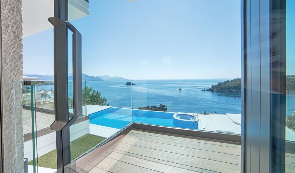 HiFinity Aluminium Sliding & Folding Doors and CS 77 Hidden Vent Aluminium Windows - Seaside villas Syvota located in Igoumenitsa, Greece