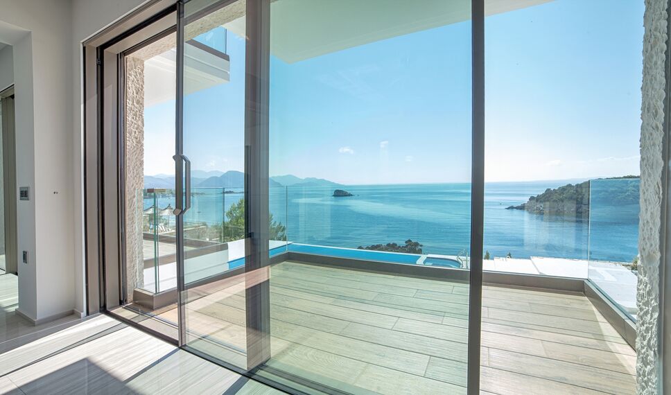 HiFinity Aluminium Sliding & Folding Doors and CS 77 Hidden Vent Aluminium Windows - Seaside villas Syvota located in Igoumenitsa, Greece