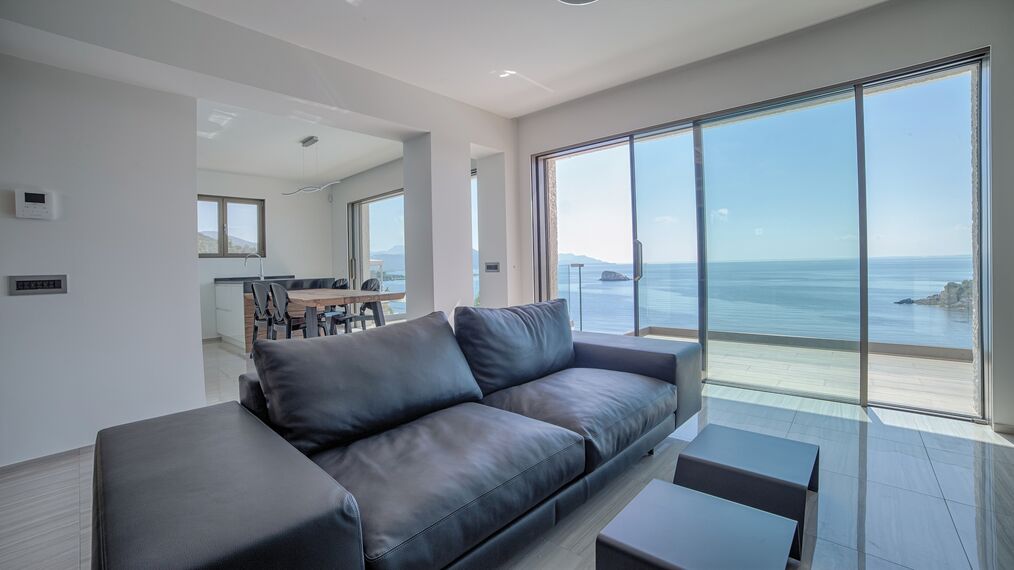 HiFinity Aluminium Sliding & Folding Doors and CS 77 Hidden Vent Aluminium Windows - Seaside villas Syvota located in Igoumenitsa, Greece