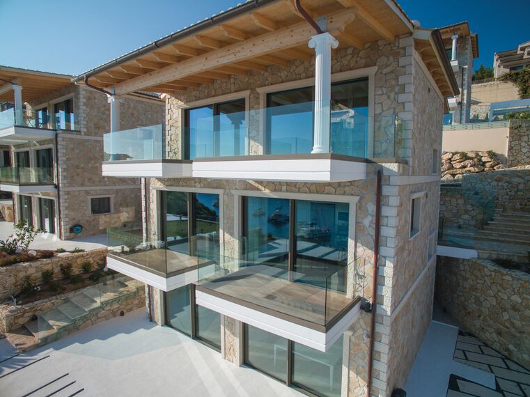 HiFinity Aluminium Sliding & Folding Doors and CS 77 Hidden Vent Aluminium Windows - Seaside villas Syvota located in Igoumenitsa, Greece