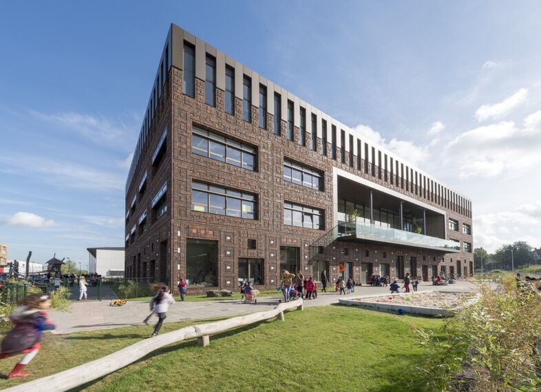 ConceptWall 50 Aluminium Façades, ConceptSystem 77 Aluminium Windows and CS 77 Hidden Vent Aluminium Windows - Brede school Houthaven located in Amsterdam, The Netherlands