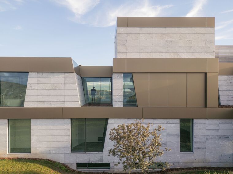 HiFinity Aluminium Sliding & Folding Doors, SlimPatio 68 Aluminium Sliding & Folding Doors and SlimLine 38 Aluminium Windows - Casa Entre Encinas located in Madrid, Spain