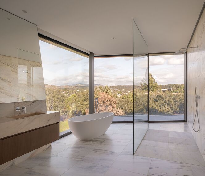 HiFinity Aluminium Sliding & Folding Doors, SlimPatio 68 Aluminium Sliding & Folding Doors and SlimLine 38 Aluminium Windows - Casa Entre Encinas located in Madrid, Spain