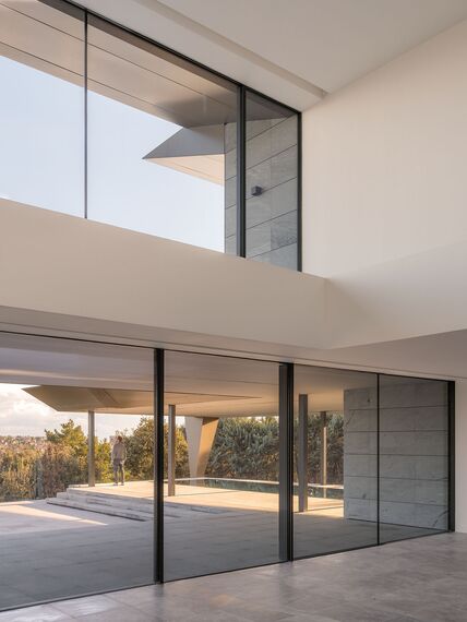 HiFinity Aluminium Sliding & Folding Doors, SlimPatio 68 Aluminium Sliding & Folding Doors and SlimLine 38 Aluminium Windows - Casa Entre Encinas located in Madrid, Spain