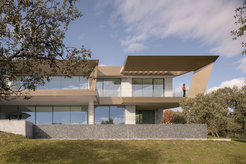 HiFinity Aluminium Sliding & Folding Doors, SlimPatio 68 Aluminium Sliding & Folding Doors and SlimLine 38 Aluminium Windows - Casa Entre Encinas located in Madrid, Spain