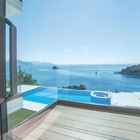 HiFinity Aluminium Sliding & Folding Doors and CS 77 Hidden Vent Aluminium Windows - Seaside villas Syvota located in Igoumenitsa, Greece