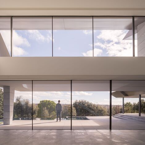 HiFinity Aluminium Sliding & Folding Doors, SlimPatio 68 Aluminium Sliding & Folding Doors and SlimLine 38 Aluminium Windows - Casa Entre Encinas located in Madrid, Spain