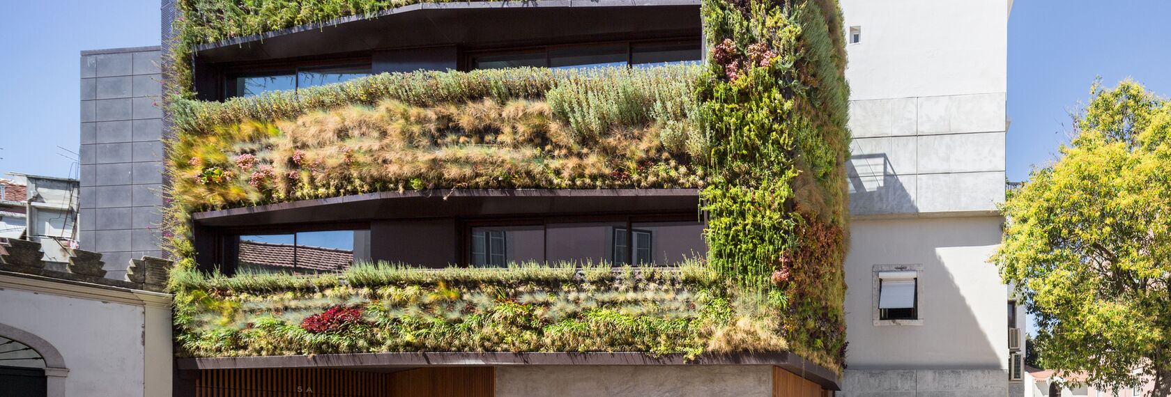 ConceptWall 50 Aluminium Façades, CP 50 Aluminium Sliding & Folding Doors and ConceptRoof 120 Aluminium Conservatories - Bio-inspired Private House located in Lisbon, Portugal