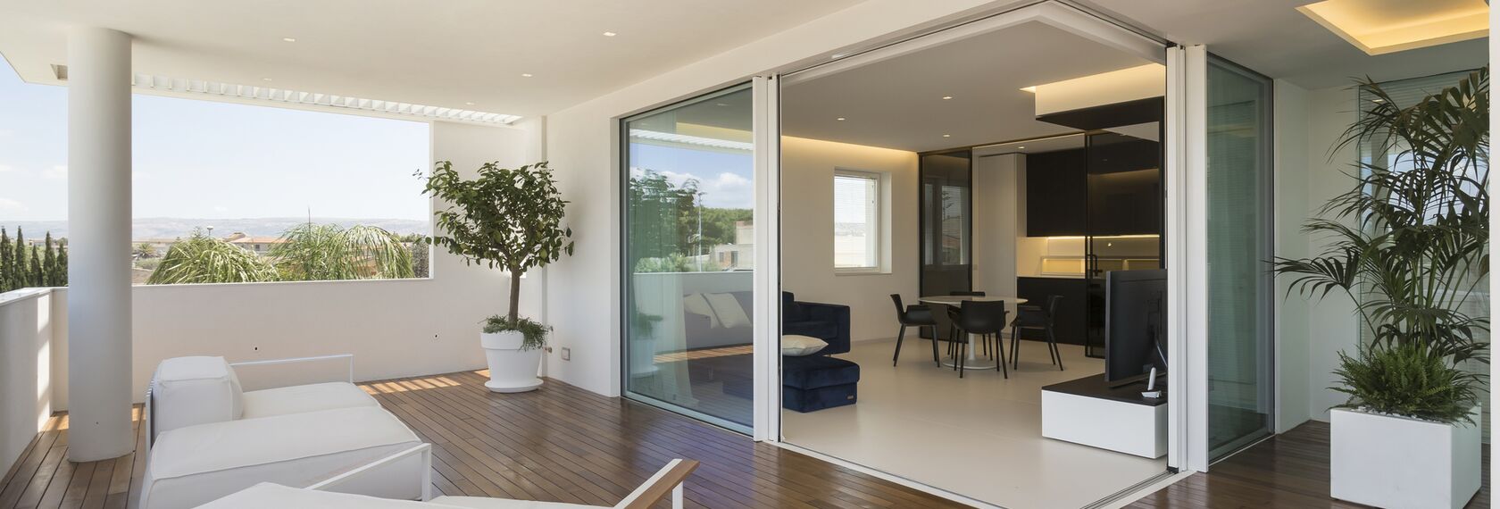 SlimPatio 68 Aluminium Sliding & Folding Doors, HiFinity Aluminium Sliding & Folding Doors, ConceptSystem 77 Aluminium Windows and CS 77 Hidden Vent Aluminium Windows - Private Apartment Casa D located in Ragusa, Italy