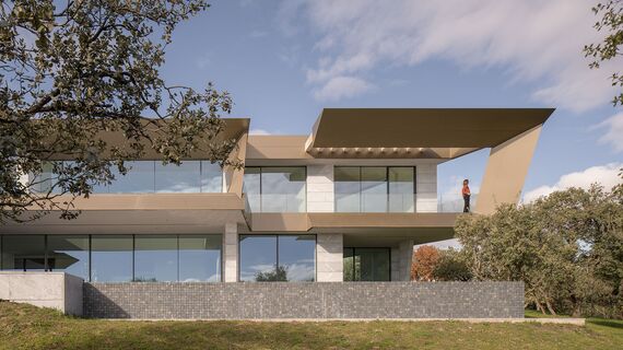 HiFinity Aluminium Sliding & Folding Doors, SlimPatio 68 Aluminium Sliding & Folding Doors and SlimLine 38 Aluminium Windows - Casa Entre Encinas located in Madrid, Spain